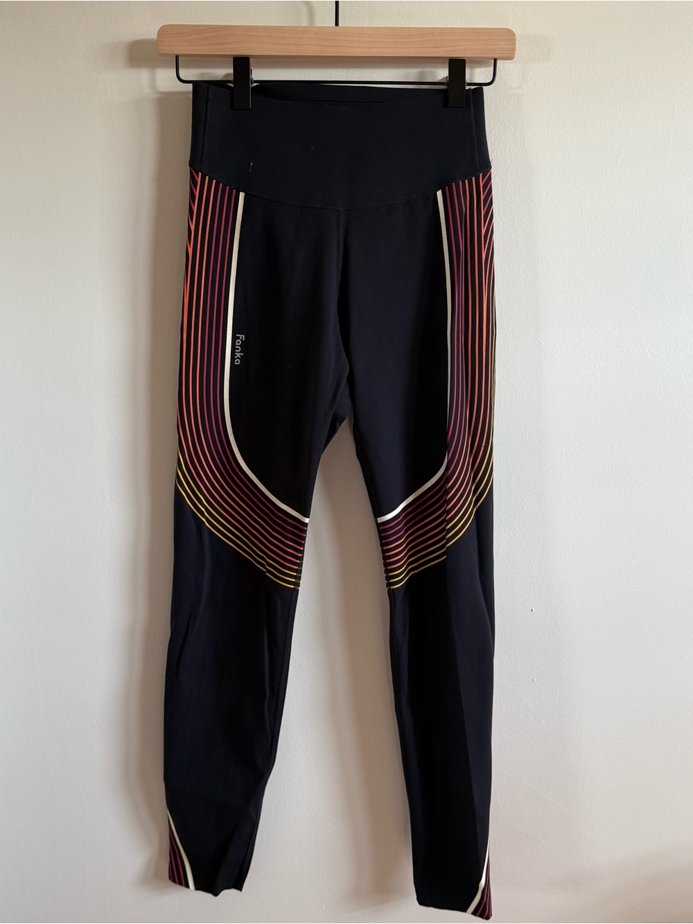 High-Rise Black Leggings with Multicolor Curved Stripe Details